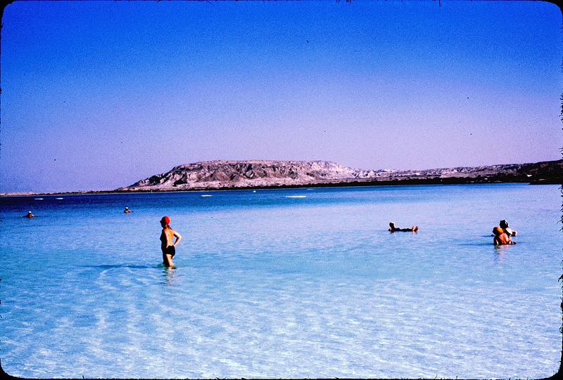 People Floating And Walking In The Dead Sea in Israel.