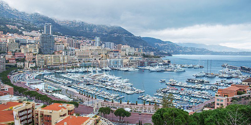 Monte Carlo Harbour Is Full Of Moored Boats And Yachts