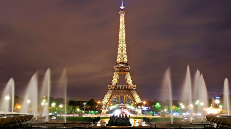 Eiffel Tower, Paris In The Evening With Fountains.