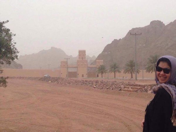 May, A Renal Nurse, With Her Head Covered By A Purple Scarf Enjoying the Outdoors of Saudi Arabia.