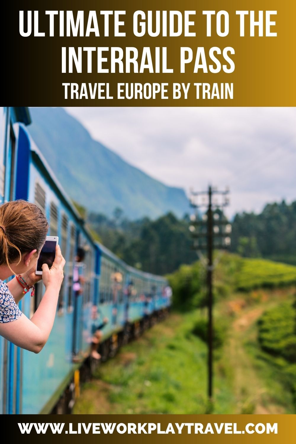 person hanging out a train window taking a photo on a European train