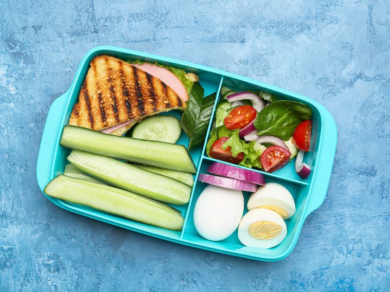 get a lunch box and take healthy snacks with you while travelling.