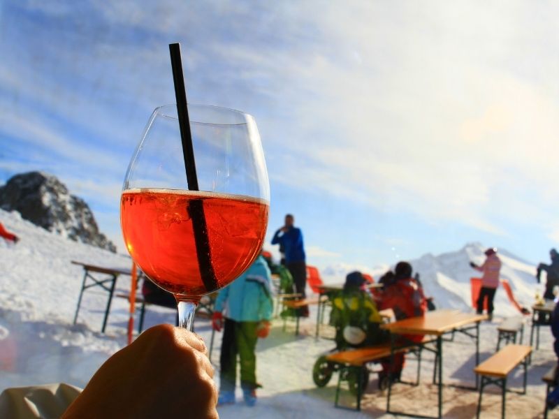 Apres Ski In Italy Could Involve A Glass of Chianti or Two. Sitting On Top Of The World.