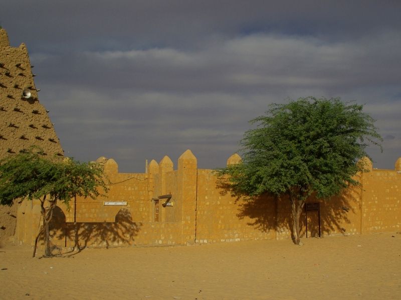 Timbuktu Is Disappearing Into The Sand But Golden Buildings And Walls Still Remain.
