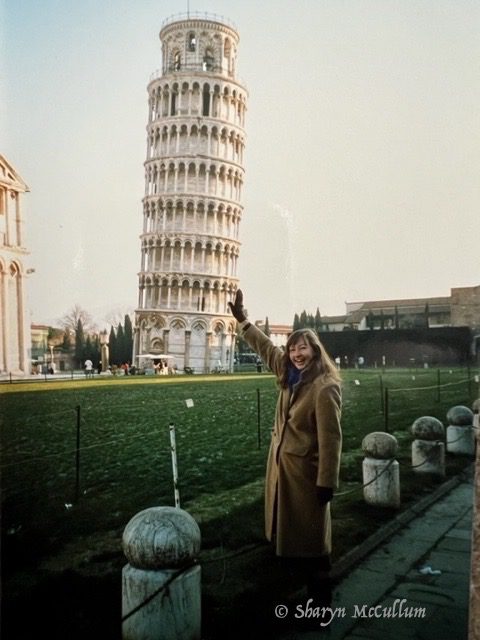 Sharyn holding up the Leaning Tower of Pisa in Italy.