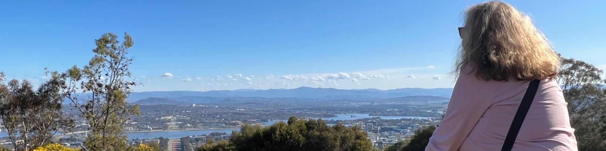 Sharyn at Mount Ainslie overlooking Canberra while travel, live and work abroad the world.