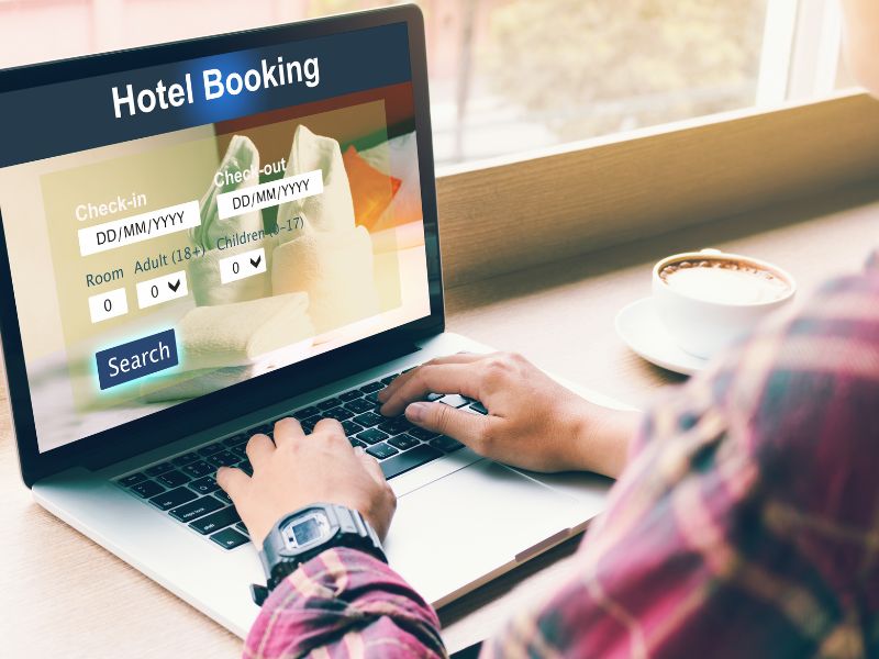 Hotel booking site on laptop booking accommodation